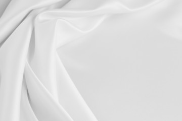White silk fabric material background. Copy space