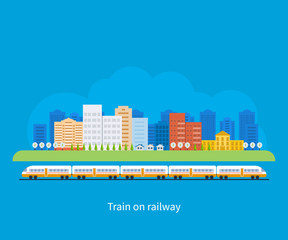 Fototapeta premium Train on railway with city background