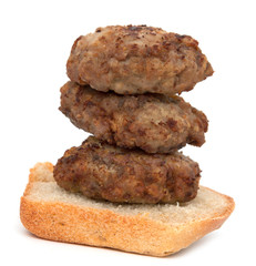 cutlet and bread on a white background