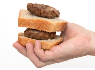 cutlet and bread on a white background