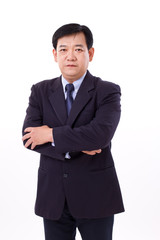 senior business executive crossing arms