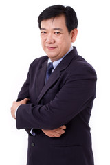 senior business executive crossing arms