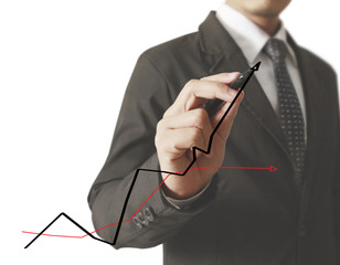 Businessman drawing graphics