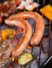 Grilled sausages on the grill