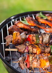 Delicious meats on garden grill