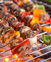 Delicious skewers on garden grill