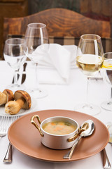 Serving plate with mushrooms and glasses of white wine