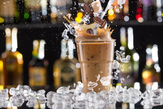 Cold Coffee Drink With Ice, Beans And Splash