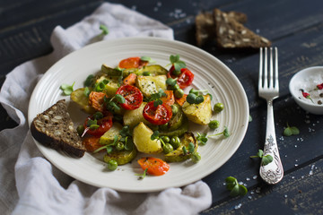 roasted vegetables in a light vintage plate 