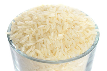 full glass of rice isolaned on white