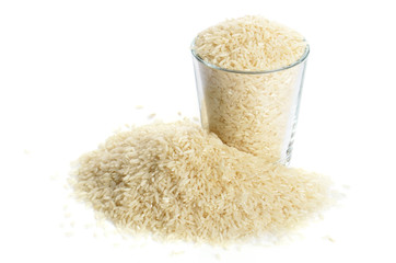 full glass of rice isolated on white