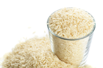 full glass of rice isolated on white