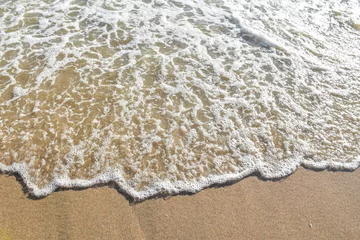 Foto op Plexiglas Soft wave of sea on sand beach © dreammubb