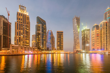 Fototapeta na wymiar Dubai marina skyscrapers during night hours