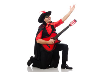 Young man in carnival coat  with guitar isolated on white