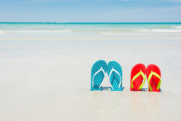 Naklejka premium Beach, slippers on tropical beach
