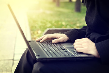 Hands on Laptop Closeup