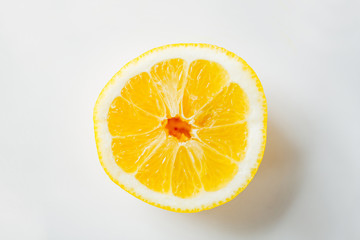 ripe orange or lemon slice over white