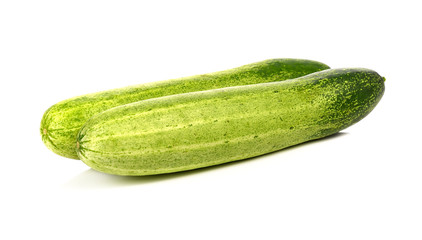 Cucumber and slices isolated over white background