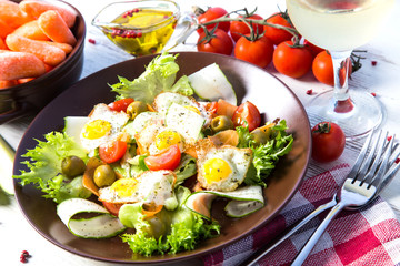 Salad vegetables and quail eggs