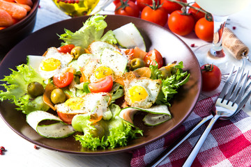 Salad vegetables and quail eggs