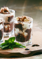 Chocolate dessert with ice cream and mint, selective focus