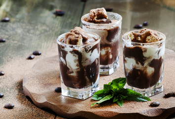 Chocolate dessert with ice cream and mint, selective focus