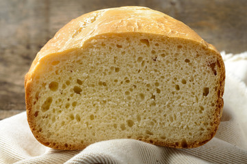 Loaf of bread on the linen napkin,