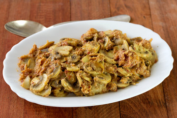 mushrooms with farinheira on white dish