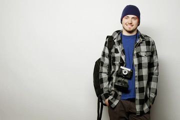 young  photographer over white background