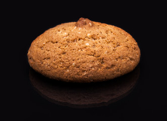 hot oatmeal on a black background with reflection