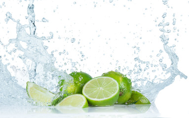 Limes with water splash