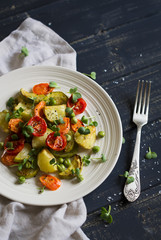 roasted vegetables in a light vintage plate 