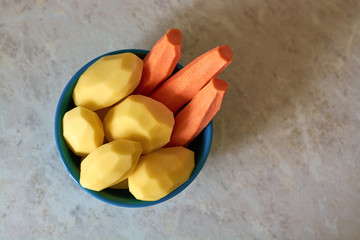 Peeled carrots and potatoes