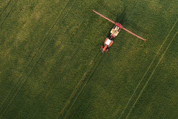 aerial view of harvest fields with tractor