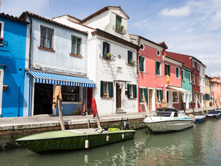 Fototapeta na wymiar Burano, Italy - Painted buildings and canals on the