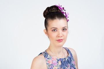 Portrait of pretty young girl on white background