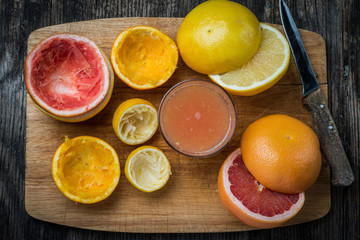 Fototapeta na wymiar Preparing citrus juice
