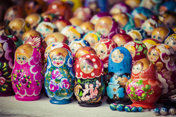 Fototapeta na wymiar Colorful Russian nesting dolls matreshka at the market. Matriosh