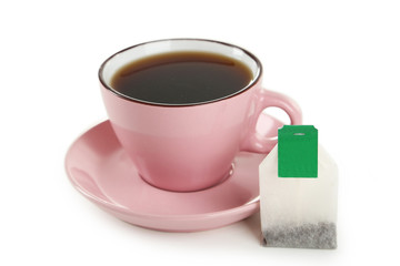 Cup of tea with tea bag isolated on white