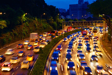 heavy traffic moving on the road in twilight, Kuala Lumpur