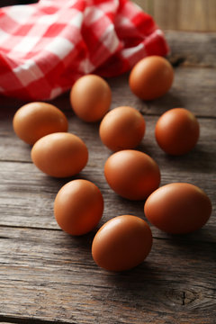 Chicken eggs on grey wooden background