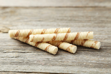 Waffle striped rolls on grey wooden background