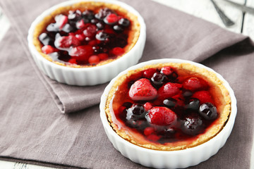 Fresh berry tarts on napkin
