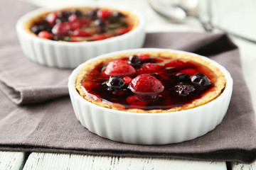 Fresh berry tarts on napkin