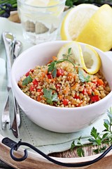 Quinoa salad with vegetables,herbs and lemon.