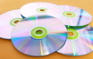 DVDs on a yellow background