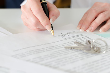Client signing a real estate contract