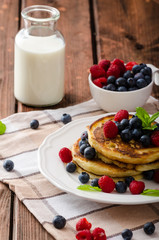 Pancakes with forest fruit and mint