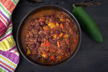 chili con carne beef chili on black table